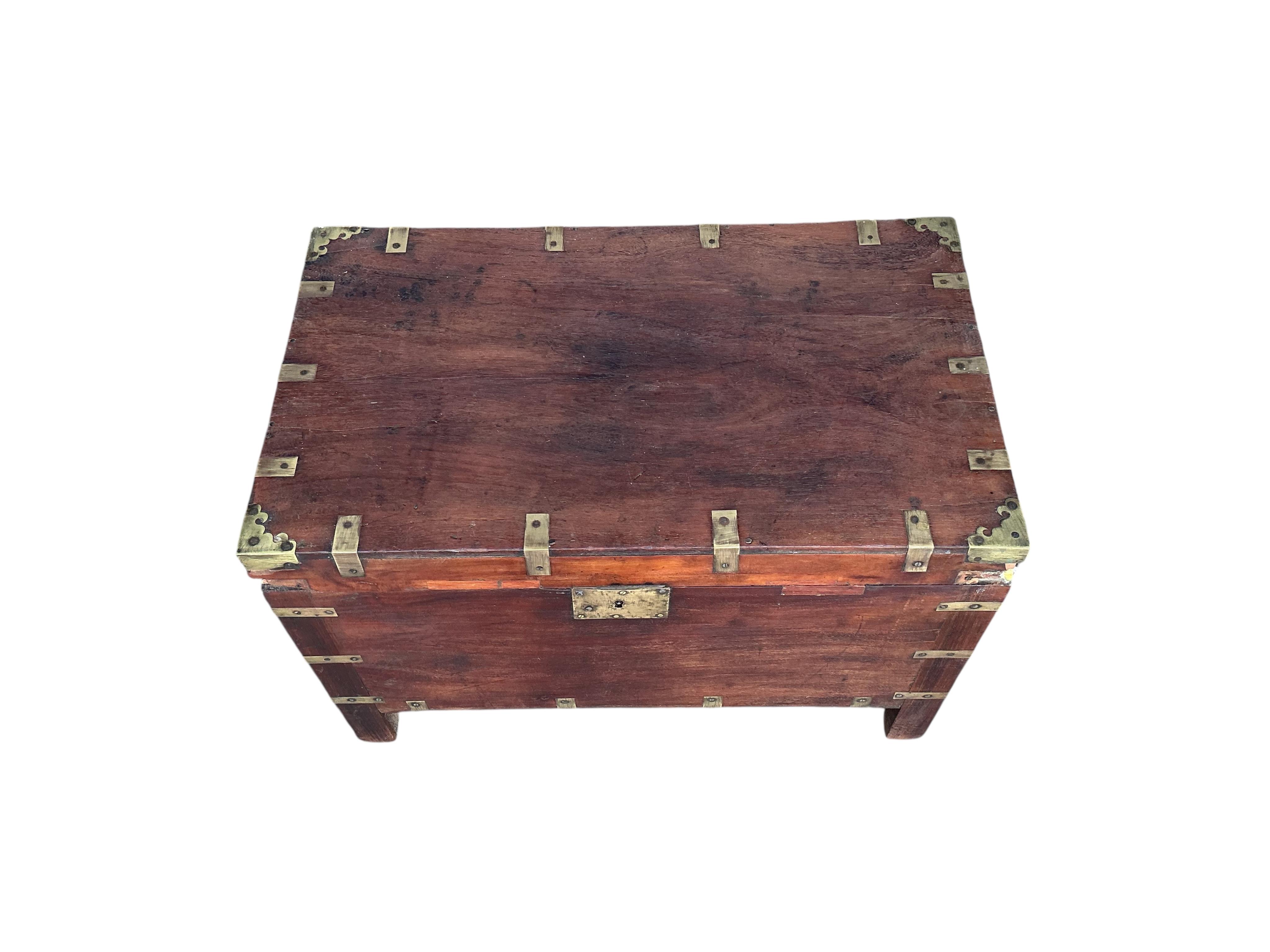 A brass mounted rectangular hardwood trunk, width 72cm, depth 42cm, height 49cm
